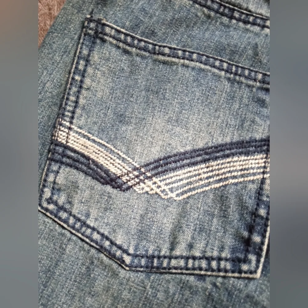 Oleg Cassini jeans with pocket embroidery